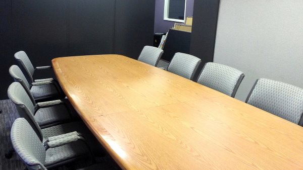 The setting for a manifestation determination review meeting, conference room with conference table and chairs
